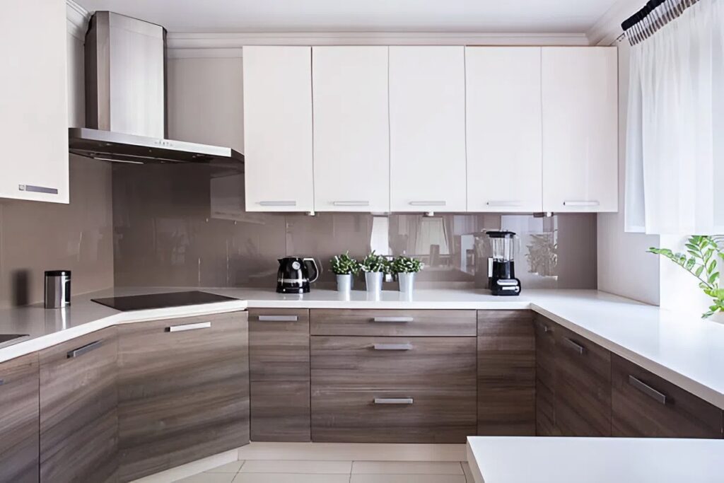 Kitchen cabinets with crisp white upper cabinets and warm wood-tone lower cabinets by a house painter in East Hampton, CT