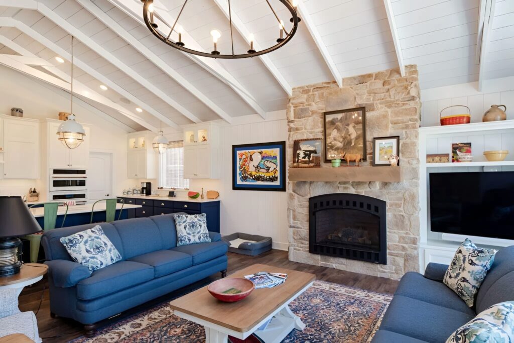 Living room with white paneled walls and neutral paint trims by an interior painter in East Hampton, CT